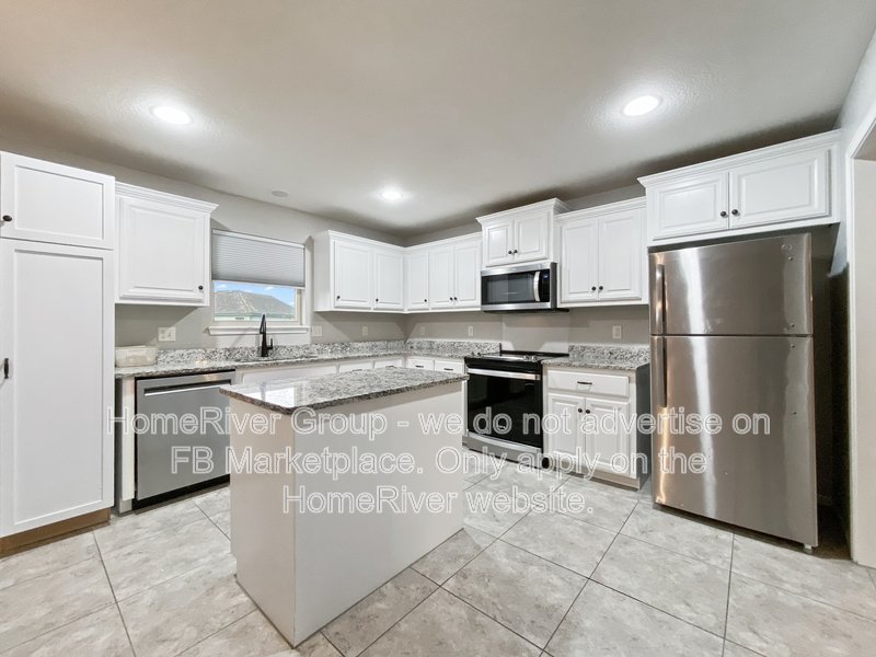 Beautifully Upgraded 4-Bedroom, 2-Bath Split-Level Home property image